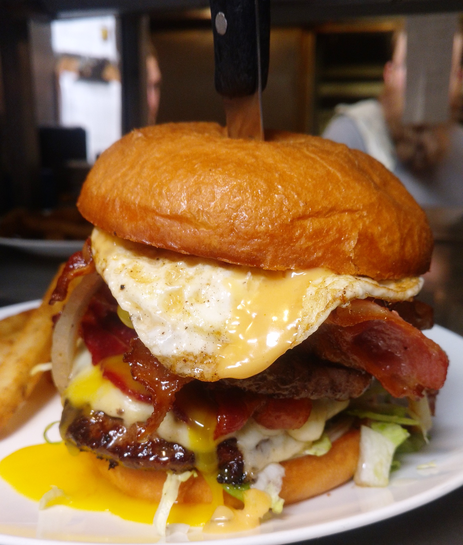 Bacon Lovers Signature burger with egg